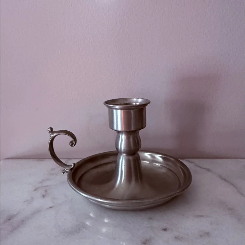 an Early American Pewter by Web chamberstick candle holder